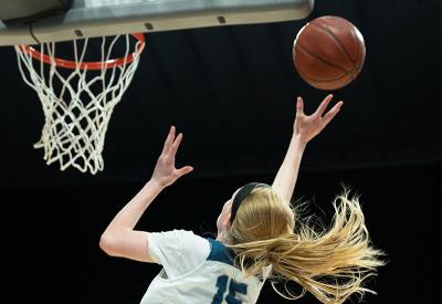 woman playing basketball