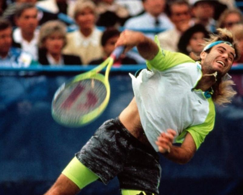 Andre Agassi playing tennis